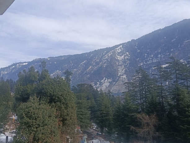Imagen de los exteriores del Hotel Goroomgo Saras Manali. Foto 16