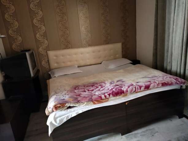Imagen de la habitación del Hotel Goroomgo Shah Guest House Nainital. Foto 8