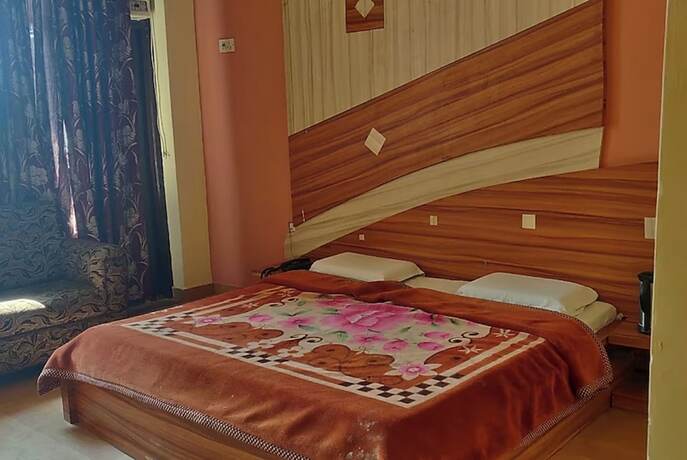 Imagen de la habitación del Hotel Goroomgo Shakuntala Katra. Foto 20