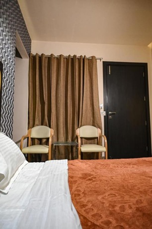 Imagen de la habitación del Hotel Goroomgo Shamyana Punjab. Foto 7