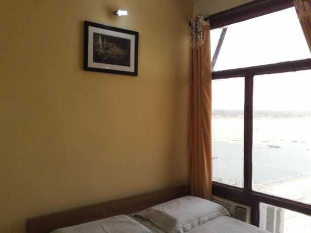 Imagen de la habitación del Hotel Goroomgo Shanti Guest House Varanasi. Foto 14