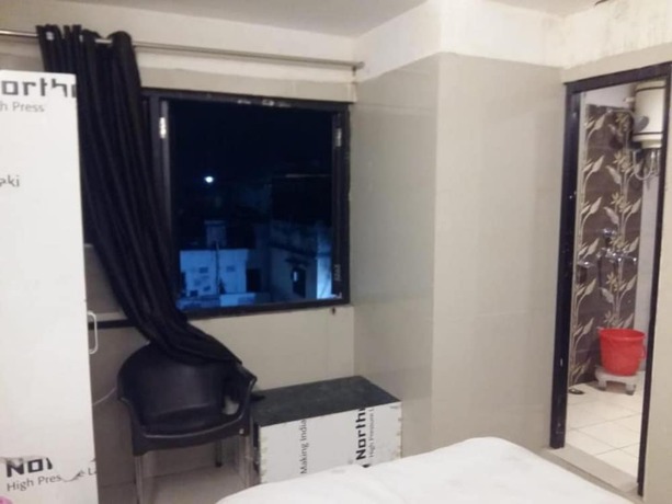 Imagen de la habitación del Hotel Goroomgo Shiva Inn Haridwar. Foto 2