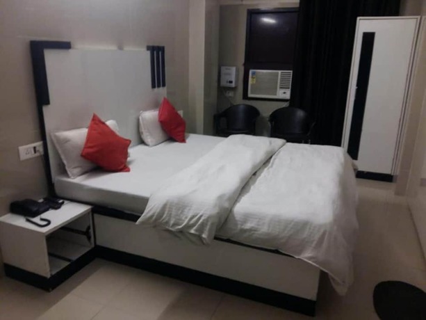 Imagen de la habitación del Hotel Goroomgo Shiva Inn Haridwar. Foto 4
