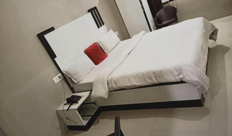Imagen de la habitación del Hotel Goroomgo Shiva Inn Haridwar. Foto 6