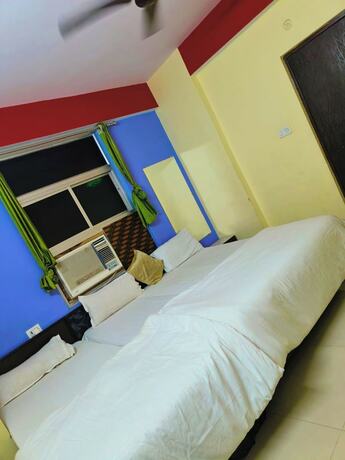 Imagen de la habitación del Hotel Goroomgo Shivay Guest House Varanasi. Foto 14