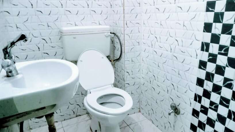 Imagen de la habitación del Hotel Goroomgo Shivay Guest House Varanasi. Foto 16