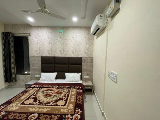 Imagen de la habitación del Hotel Goroomgo Shree Krishnas Amritsar. Foto 11