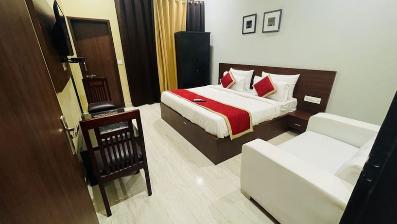 Imagen de la habitación del Hotel Goroomgo Shri Ganesh Jaipur. Foto 10