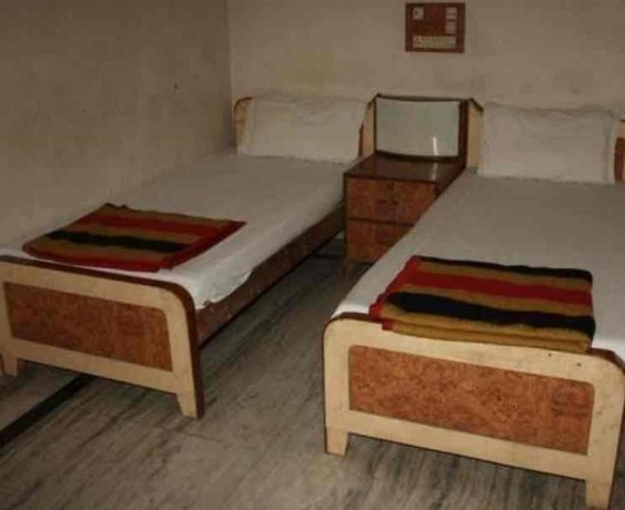 Imagen de la habitación del Hotel Goroomgo Shyam Inn Mathura. Foto 9
