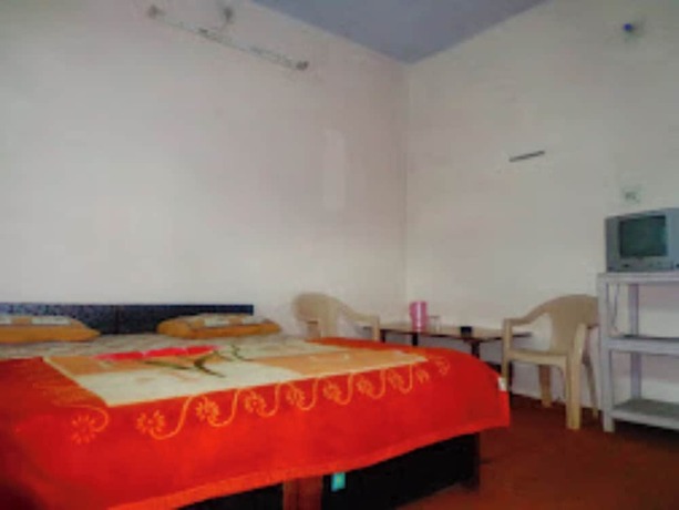 Imagen de la habitación del Hotel Goroomgo Snow View Guest House Kausani. Foto 6
