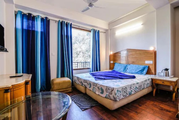 Imagen de la habitación del Hotel Goroomgo Solo Home Shimla. Foto 9