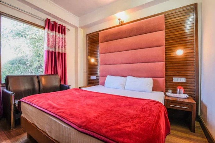 Imagen de la habitación del Hotel Goroomgo Solo Home Shimla. Foto 11