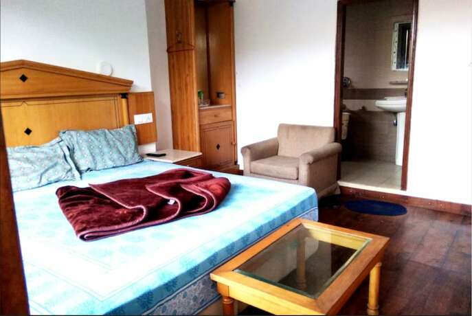 Imagen de la habitación del Hotel Goroomgo Solo Home Shimla. Foto 12