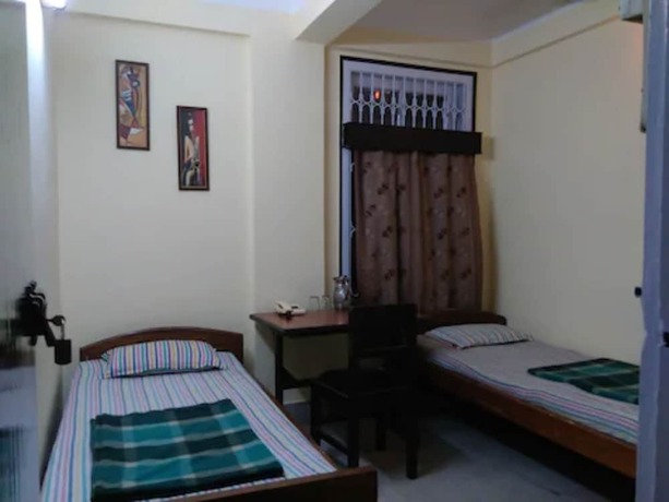 Imagen de la habitación del Hotel Goroomgo Suhana Homestay Guwahati. Foto 7