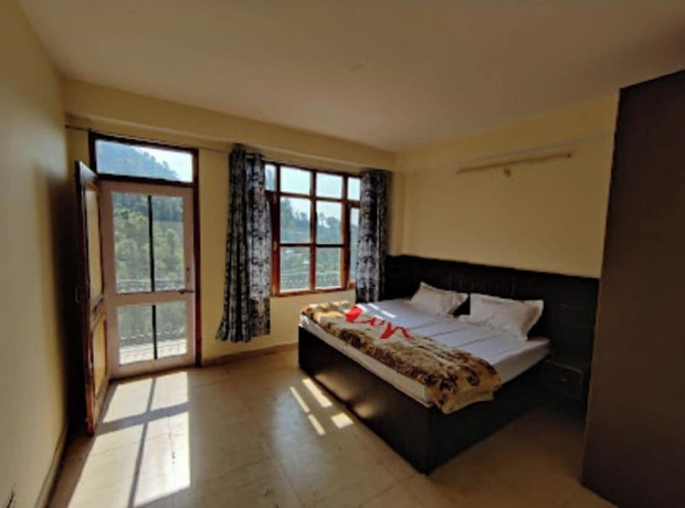 Imagen de la habitación del Hotel Goroomgo Sukh Dham Homestay Shimla. Foto 10