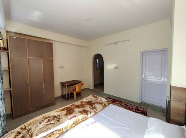 Imagen de la habitación del Hotel Goroomgo Sukh Dham Homestay Shimla. Foto 11