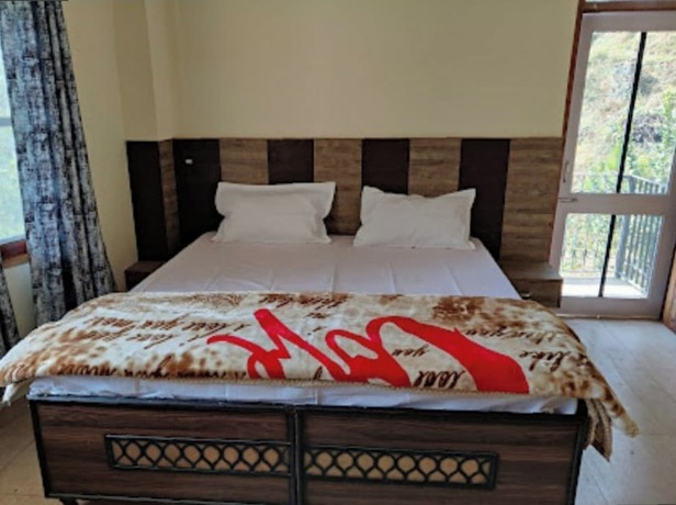 Imagen de la habitación del Hotel Goroomgo Sukh Dham Homestay Shimla. Foto 12