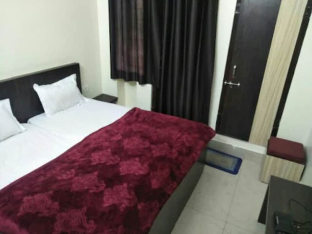 Imagen de la habitación del Hotel Goroomgo Surabhi Ajmer. Foto 5