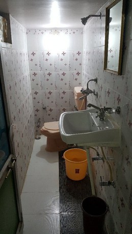 Imagen de la habitación del Hotel Goroomgo Swagat Bhubneshwar. Foto 4