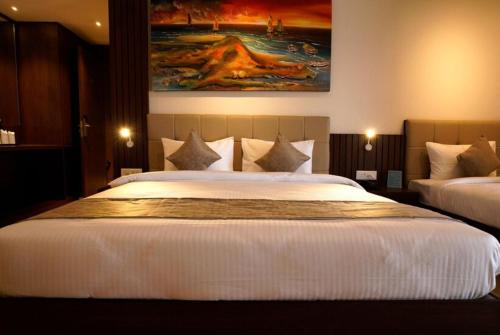 Imagen de la habitación del Hotel Goroomgo Swarna Digha Near New Digha Sea Beach 300m. Foto 17