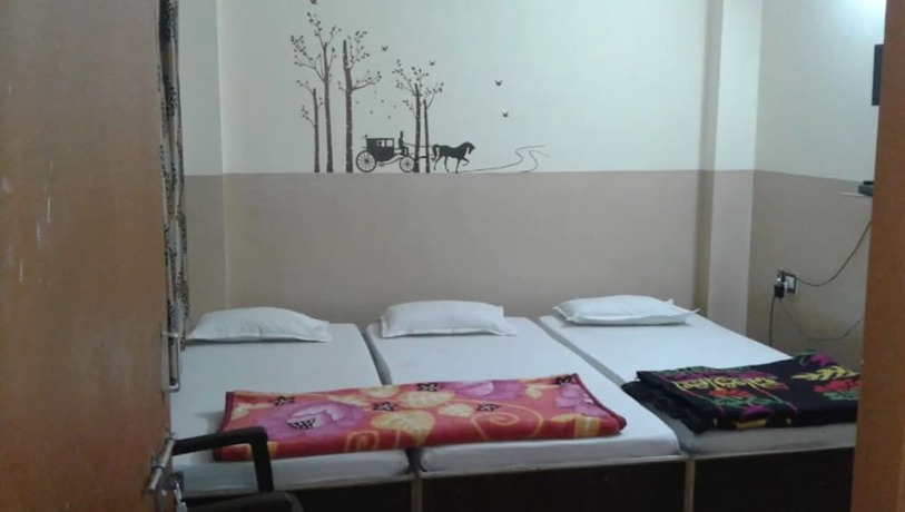 Imagen de la habitación del Hotel Goroomgo Swastik Guest House Varanasi. Foto 13