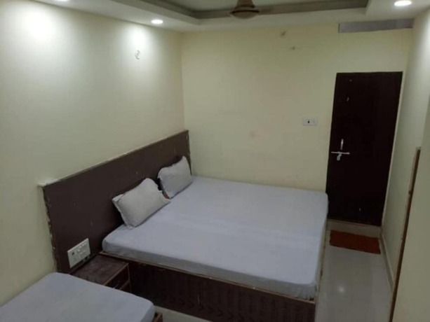 Imagen de la habitación del Hotel Goroomgo Swastik Guest House Varanasi. Foto 14
