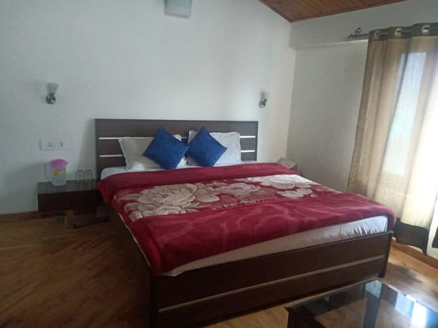 Imagen de la habitación del Hotel Goroomgo Tara Cottage Manali. Foto 10