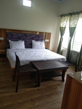Imagen de la habitación del Hotel Goroomgo Tejas Mussoorie. Foto 9