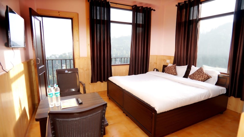Imagen de la habitación del Hotel Goroomgo Thakur Home\'s Shimla. Foto 5