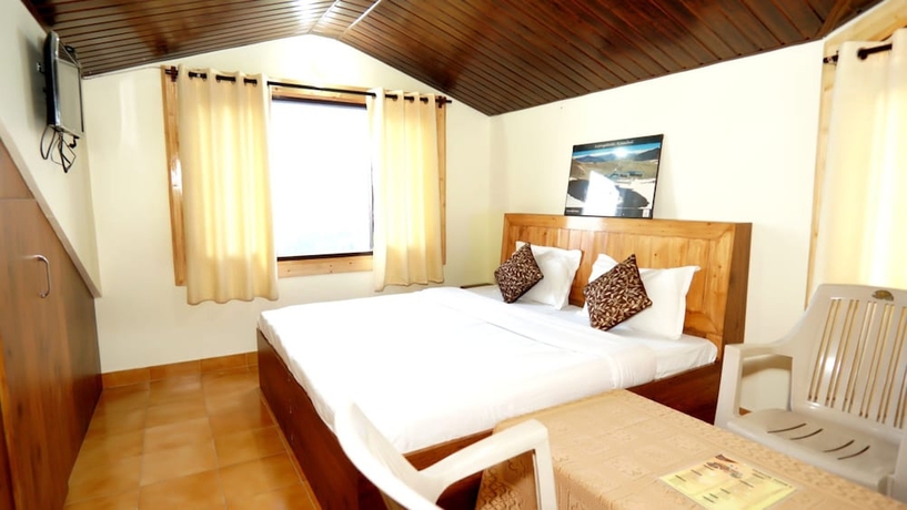 Imagen de la habitación del Hotel Goroomgo Thakur Home\'s Shimla. Foto 6