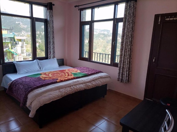 Imagen de la habitación del Hotel Goroomgo Thakur Home\'s Shimla. Foto 7