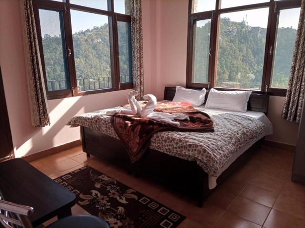 Imagen de la habitación del Hotel Goroomgo Thakur Home\'s Shimla. Foto 8