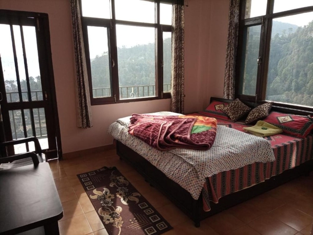 Imagen de la habitación del Hotel Goroomgo Thakur Home\'s Shimla. Foto 9