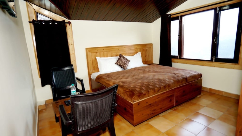 Imagen de la habitación del Hotel Goroomgo Thakur Home\'s Shimla. Foto 13