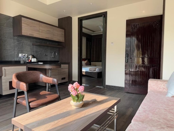 Imagen de la habitación del Hotel Goroomgo The Coco Cabana Varanasi. Foto 7