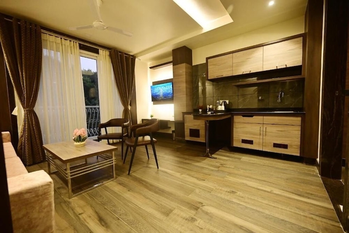 Imagen de la habitación del Hotel Goroomgo The Coco Cabana Varanasi. Foto 8