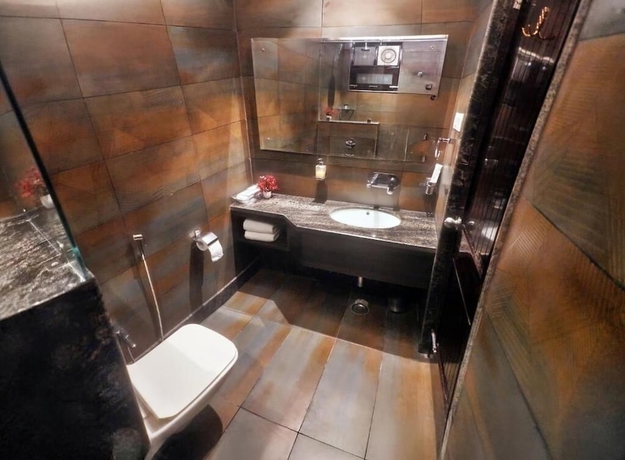 Imagen de la habitación del Hotel Goroomgo The Coco Cabana Varanasi. Foto 10