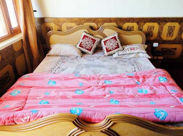 Imagen de la habitación del Hotel Goroomgo Tribhuwan Ranikhet. Foto 16
