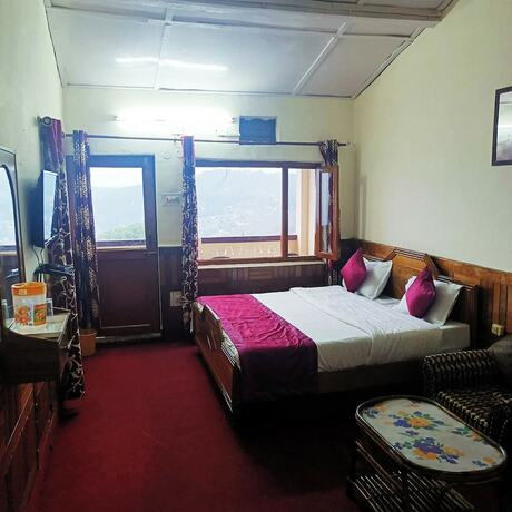 Imagen de la habitación del Hotel Goroomgo Tribhuwan Ranikhet. Foto 20