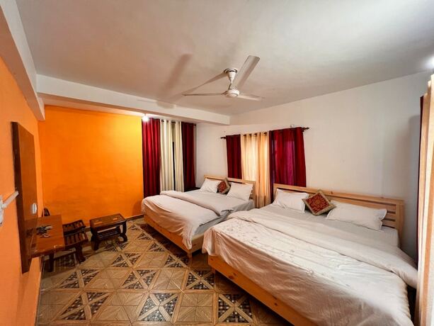 Imagen de la habitación del Hotel Goroomgo Uday Homestay Himachal Pradesh. Foto 18