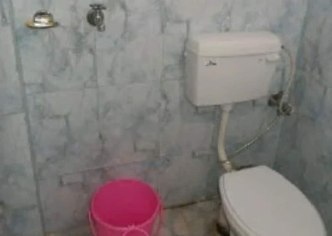 Imagen de la habitación del Hotel Goroomgo Uma Ganga Guest House Varanasi. Foto 8