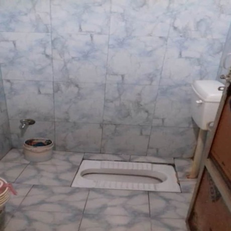 Imagen de la habitación del Hotel Goroomgo Uma Ganga Guest House Varanasi. Foto 9