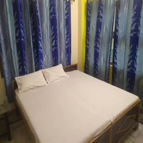 Imagen de la habitación del Hotel Goroomgo Uma Ganga Guest House Varanasi. Foto 14