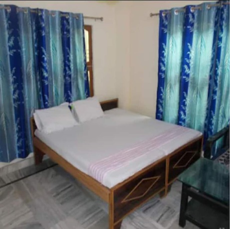 Imagen de la habitación del Hotel Goroomgo Uma Ganga Guest House Varanasi. Foto 18