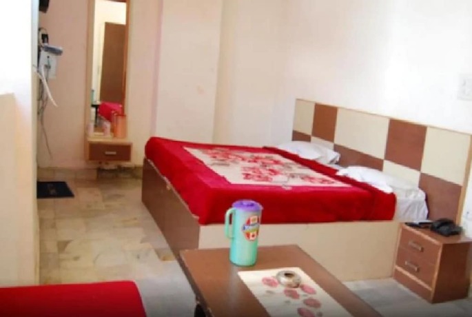 Imagen de la habitación del Hotel Goroomgo Viren Holiday Home Agra. Foto 18