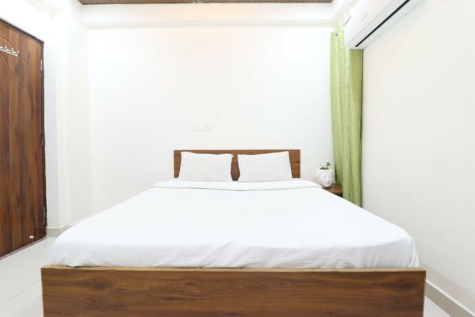 Imagen de la habitación del Hotel Goroomgo YP stays Dehradun. Foto 13