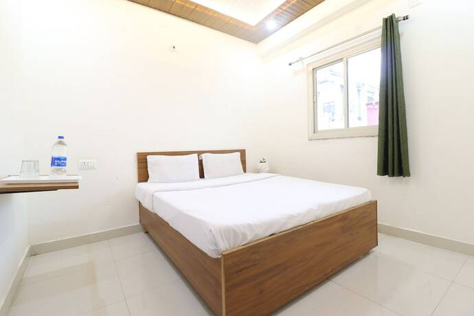Imagen de la habitación del Hotel Goroomgo YP stays Dehradun. Foto 15