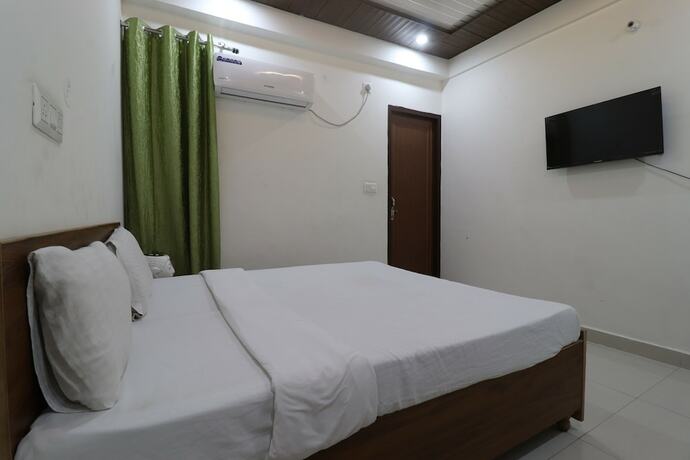 Imagen de la habitación del Hotel Goroomgo YP stays Dehradun. Foto 16