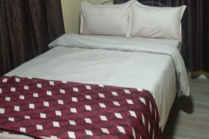 Imagen de la habitación del Hotel Goroomgo Yatri Niwas Prayagraj. Foto 4