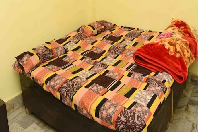 Imagen de la habitación del Hotel Goroomgo Yatri Niwas Prayagraj. Foto 8